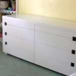 Handcrafted built-in drawer storage cabinet with white finish, integrated drawers, and clean minimalist design for a residential interior.