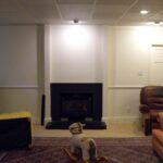 Handcrafted built-in fireplace surround with clean architectural design.