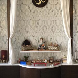 Built-in decorative shrine cabinet with symmetrical design and display area.